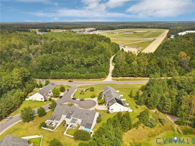 a view of a swimming pool and an outdoor seating