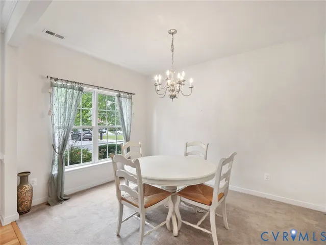a table and chairs in a room