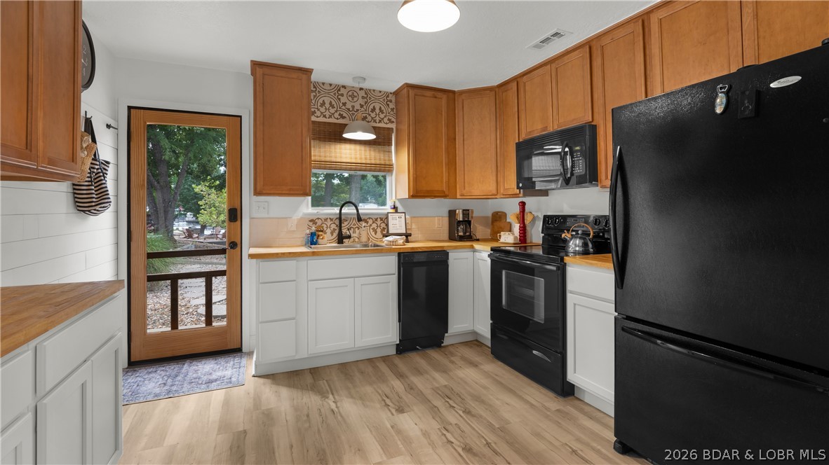 109 Red Cedar Road Sunrise Beach, MO 65079 - Photo 6 of 31 New Cabinets- Storage- Spacious