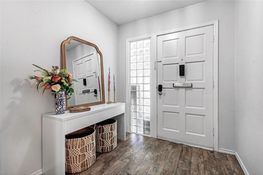 3740 Vitruvian Way, Unit D Addison, TX 75001 - Photo 2 of 22 a room with cabinets and wooden floor