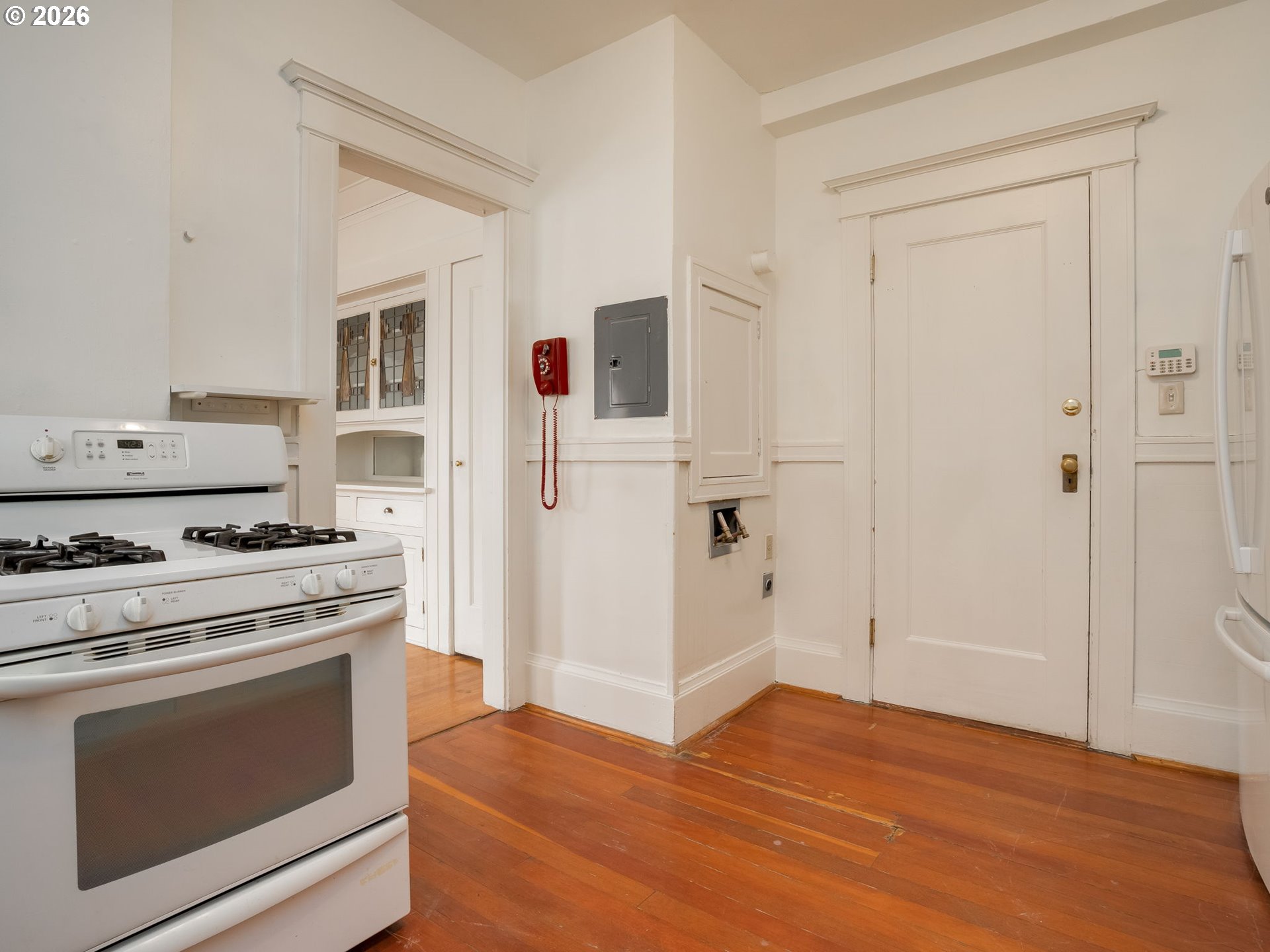 2083 Northwest Johnson Street, Unit 41 Portland, OR 97209 - Photo 17 of 25 a kitchen with a stove and a refrigerator