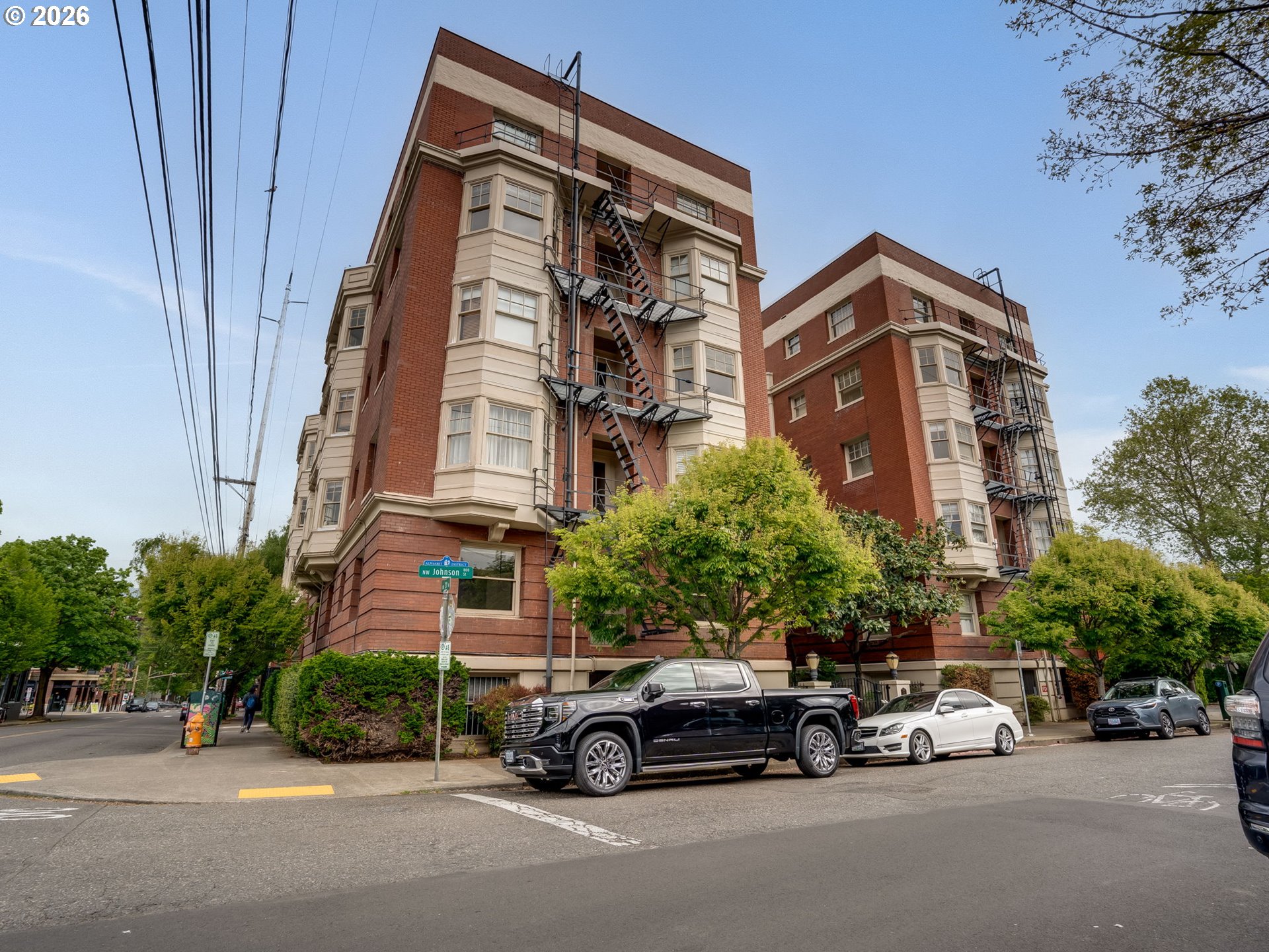 2083 Northwest Johnson Street, Unit 41 Portland, OR 97209 - Photo 3 of 25 a car parked in front of a building