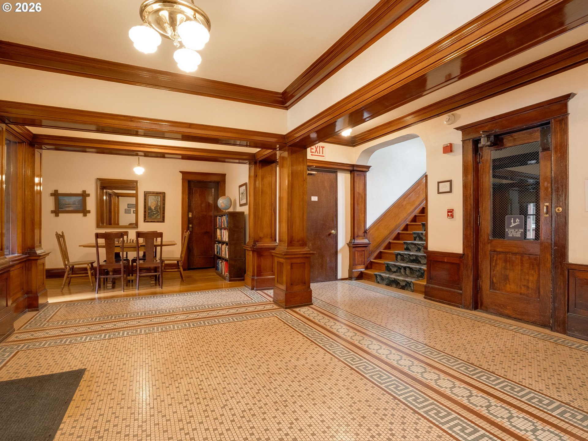 2083 Northwest Johnson Street, Unit 41 Portland, OR 97209 - Photo 5 of 25 a view of a hallway with wooden floor and couches