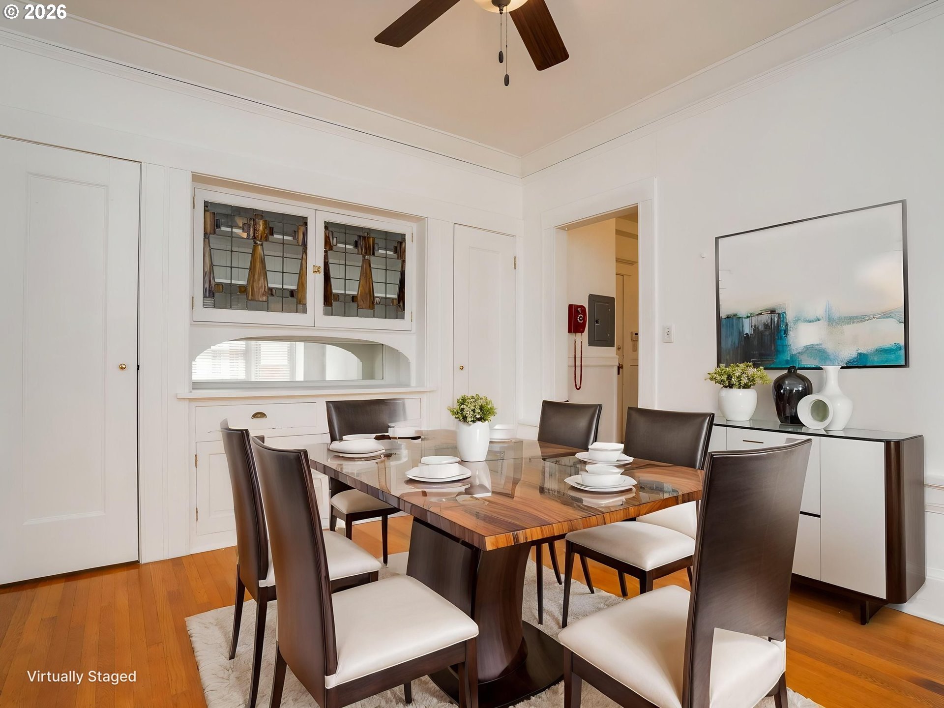 2083 Northwest Johnson Street, Unit 41 Portland, OR 97209 - Photo 9 of 25 a view of a dining room with furniture and wooden floor
