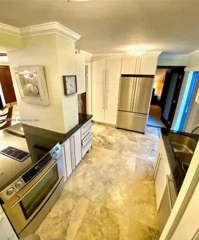 a view of an chairs in kitchen