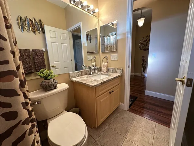 a view of a chairs and table in a patio