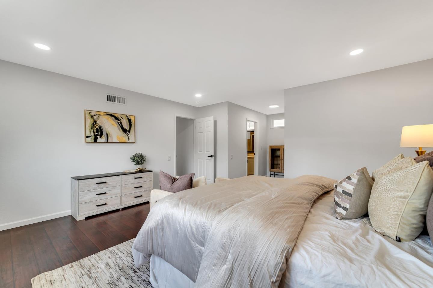 4824 Poston Drive San Jose, CA 95136 - Photo 14 of 33 a bedroom with a bed and painting on the wall