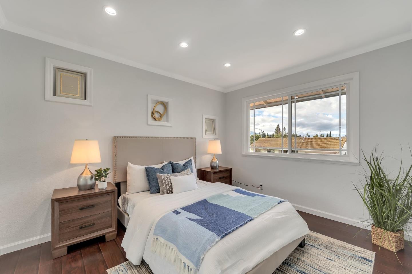 4824 Poston Drive San Jose, CA 95136 - Photo 18 of 33 a bedroom with a bed and a window
