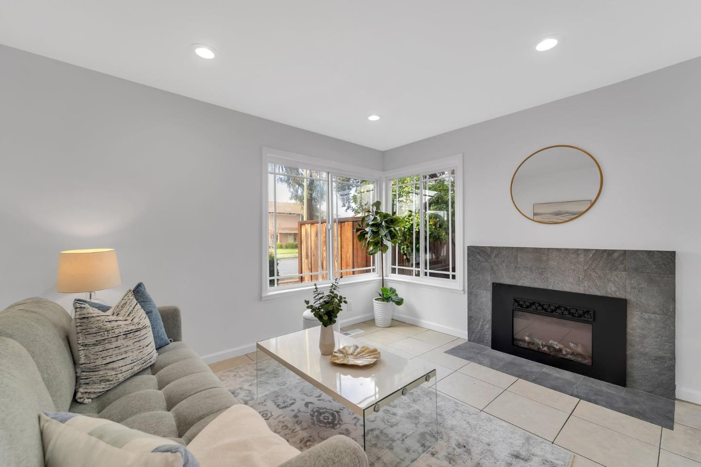 4824 Poston Drive San Jose, CA 95136 - Photo 6 of 33 a living room with furniture and a fireplace