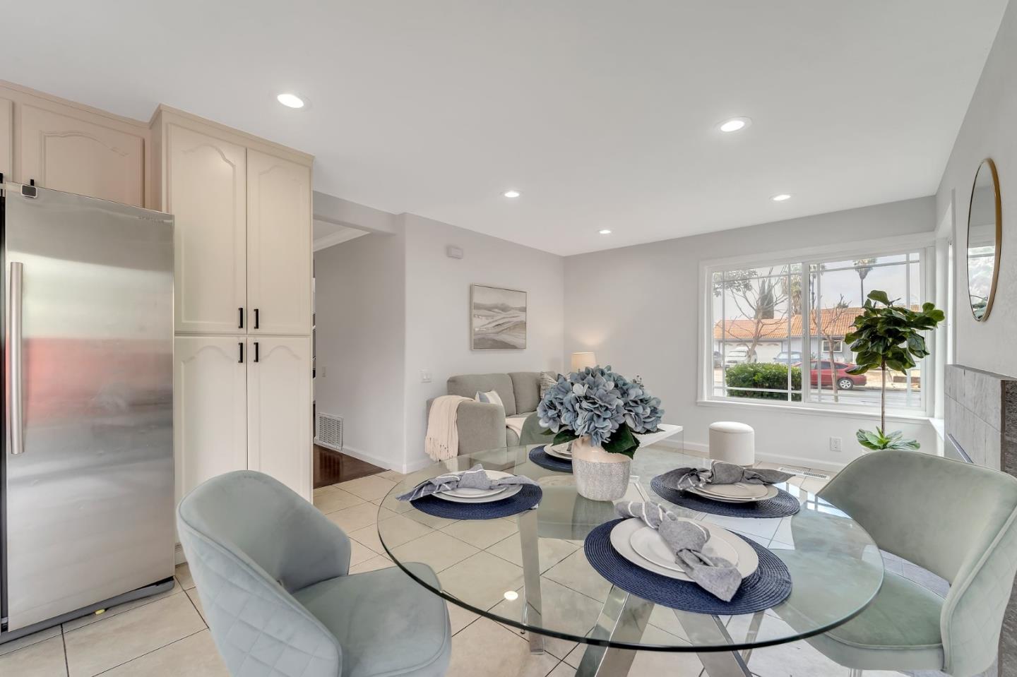 4824 Poston Drive San Jose, CA 95136 - Photo 9 of 33 a kitchen with furniture and a table