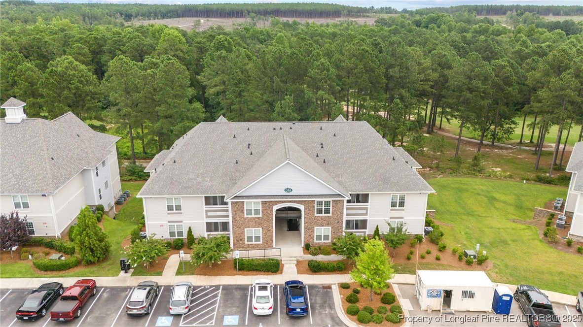 288 Gallery Drive, Unit 204 Spring Lake, NC 28390 - Photo 1 of 27 an aerial view of a house with a big yard