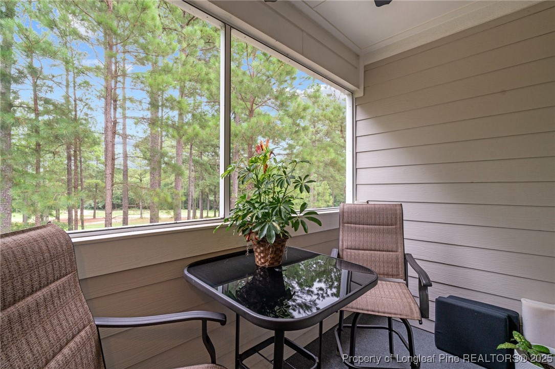 288 Gallery Drive, Unit 204 Spring Lake, NC 28390 - Photo 24 of 27 a living room with furniture and a potted plant