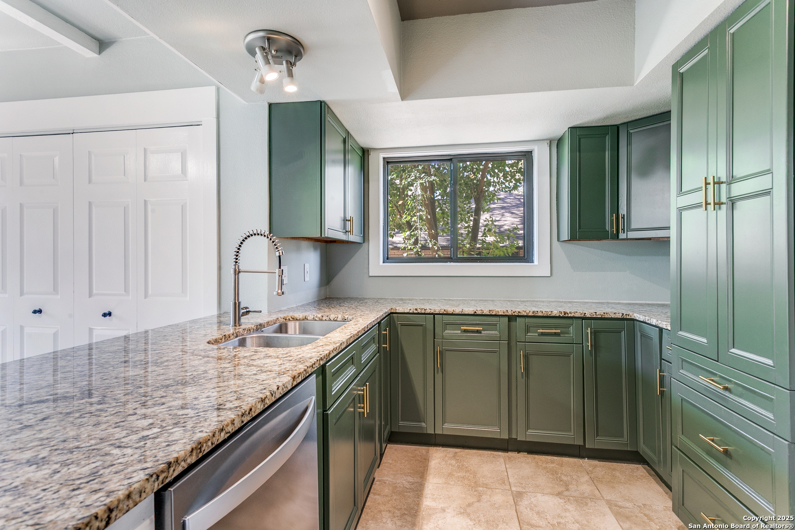 11410 Whisper Moss Street San Antonio, TX 78230 - Photo 20 of 44 a bathroom with a granite countertop sink and a mirror