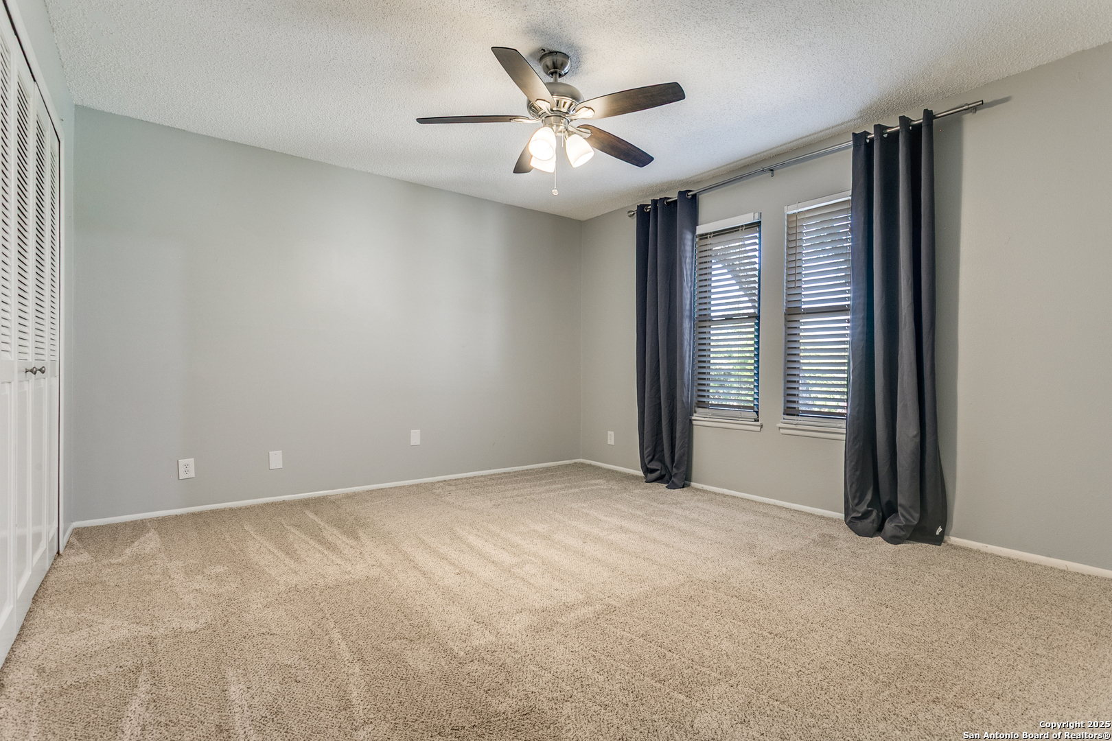 11410 Whisper Moss Street San Antonio, TX 78230 - Photo 27 of 44 a view of an empty room with a window