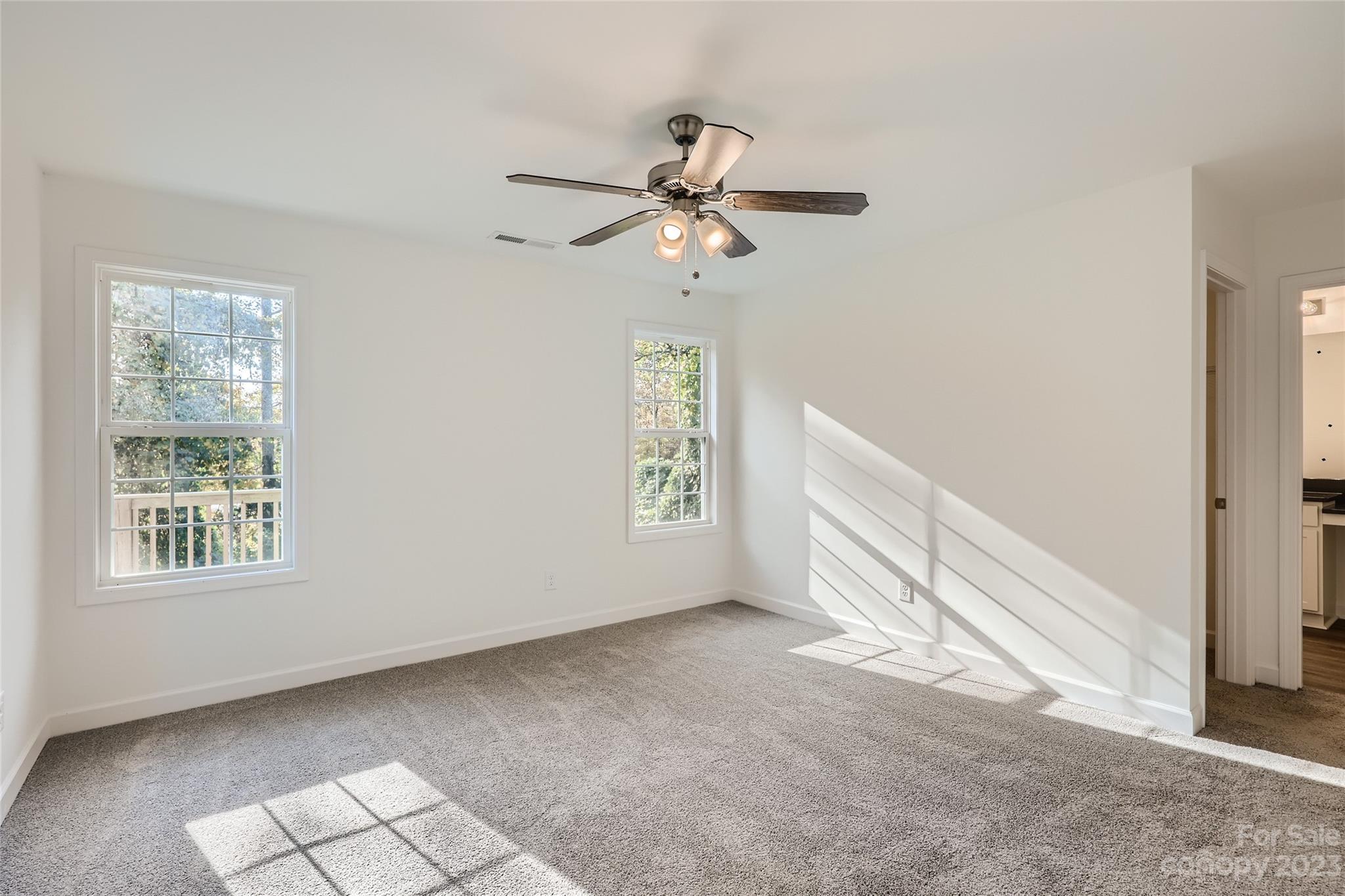 817 North Ransom Street Gastonia, NC 28052 - Photo 4 of 11 a view of an empty room with a window