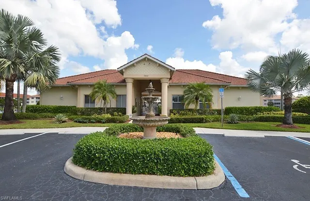 a front view of a house with a lake view