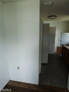 a view of entryway with wooden floor