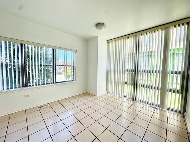 a view of an empty room and window
