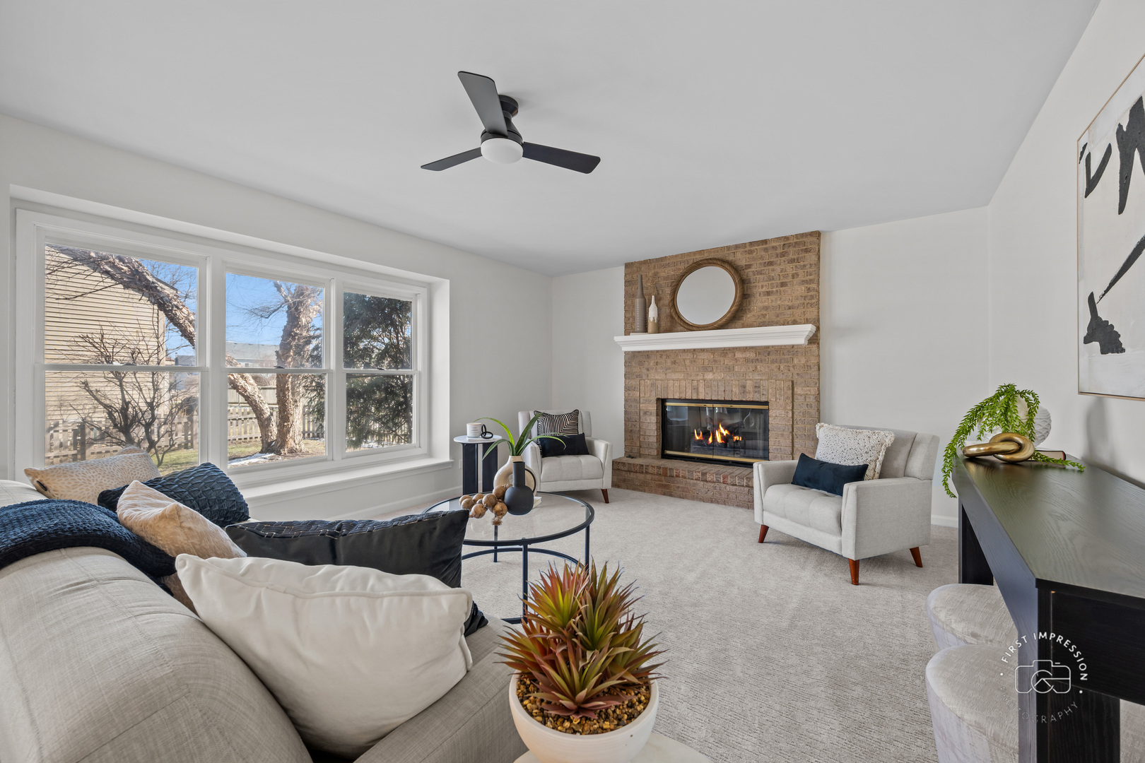 225 North Canterbury Road Aurora, IL 60506 - Photo 15 of 42 a living room with furniture and a fireplace