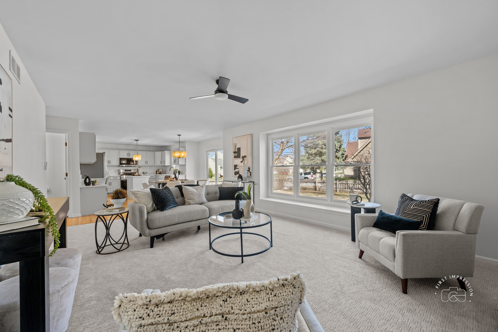 225 North Canterbury Road Aurora, IL 60506 - Photo 16 of 42 a living room with furniture and a large window