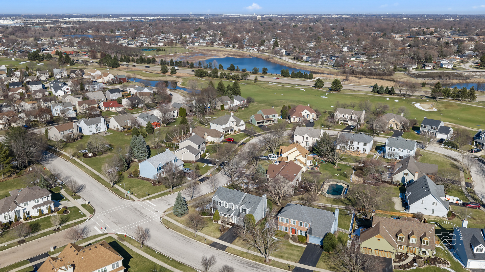 225 North Canterbury Road Aurora, IL 60506 - Photo 4 of 42 an aerial view of residential houses with outdoor space