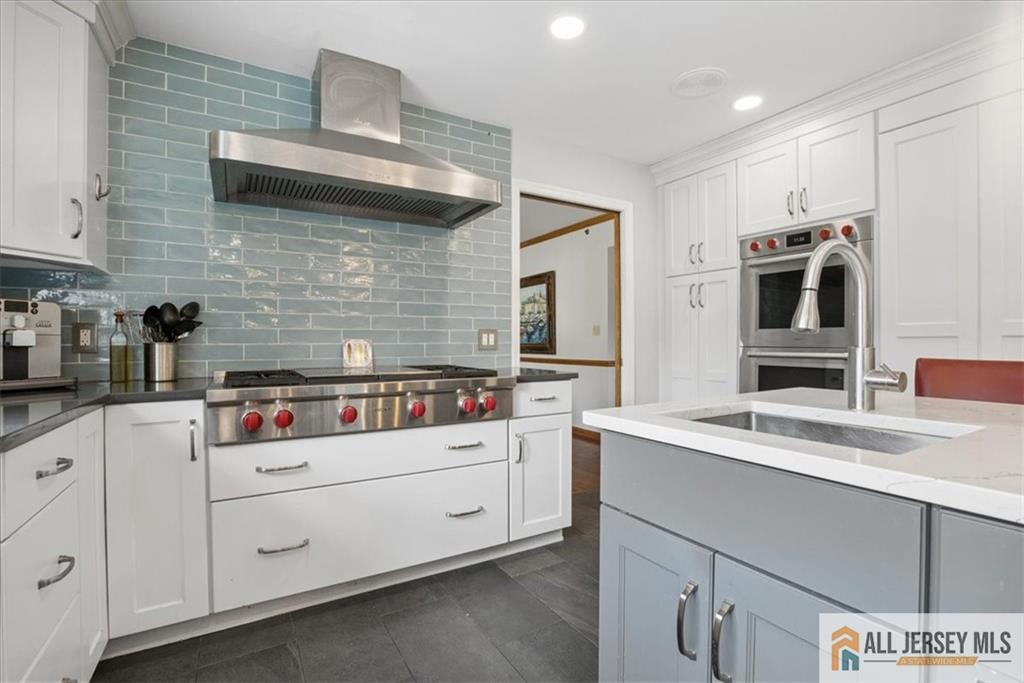 167 Federal Road Monroe Township, NJ 08831 - Photo 11 of 46 a kitchen with a sink and cabinets