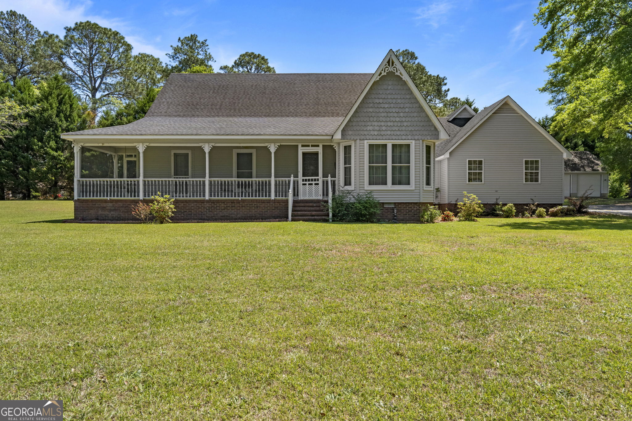 a front view of a house with yard