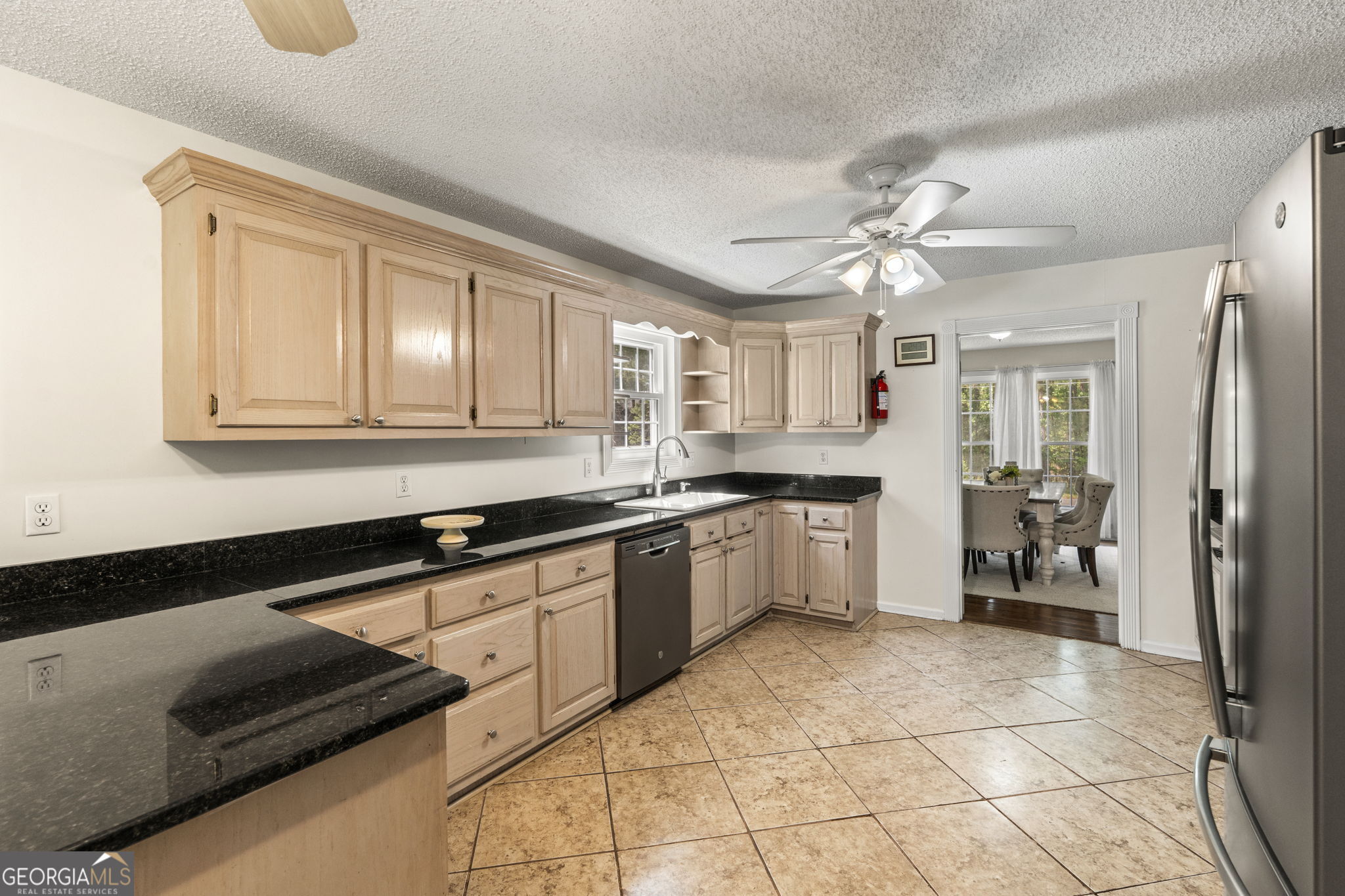 119 Moll Drive Cochran, GA 31014 - Photo 20 of 66 a kitchen with a sink cabinets and window