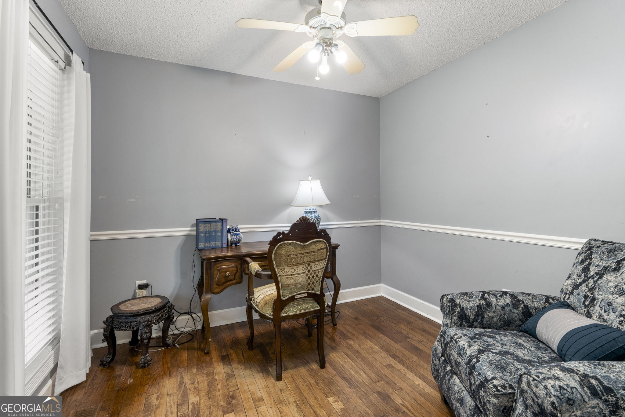 119 Moll Drive Cochran, GA 31014 - Photo 25 of 66 a living room with furniture and wooden floor