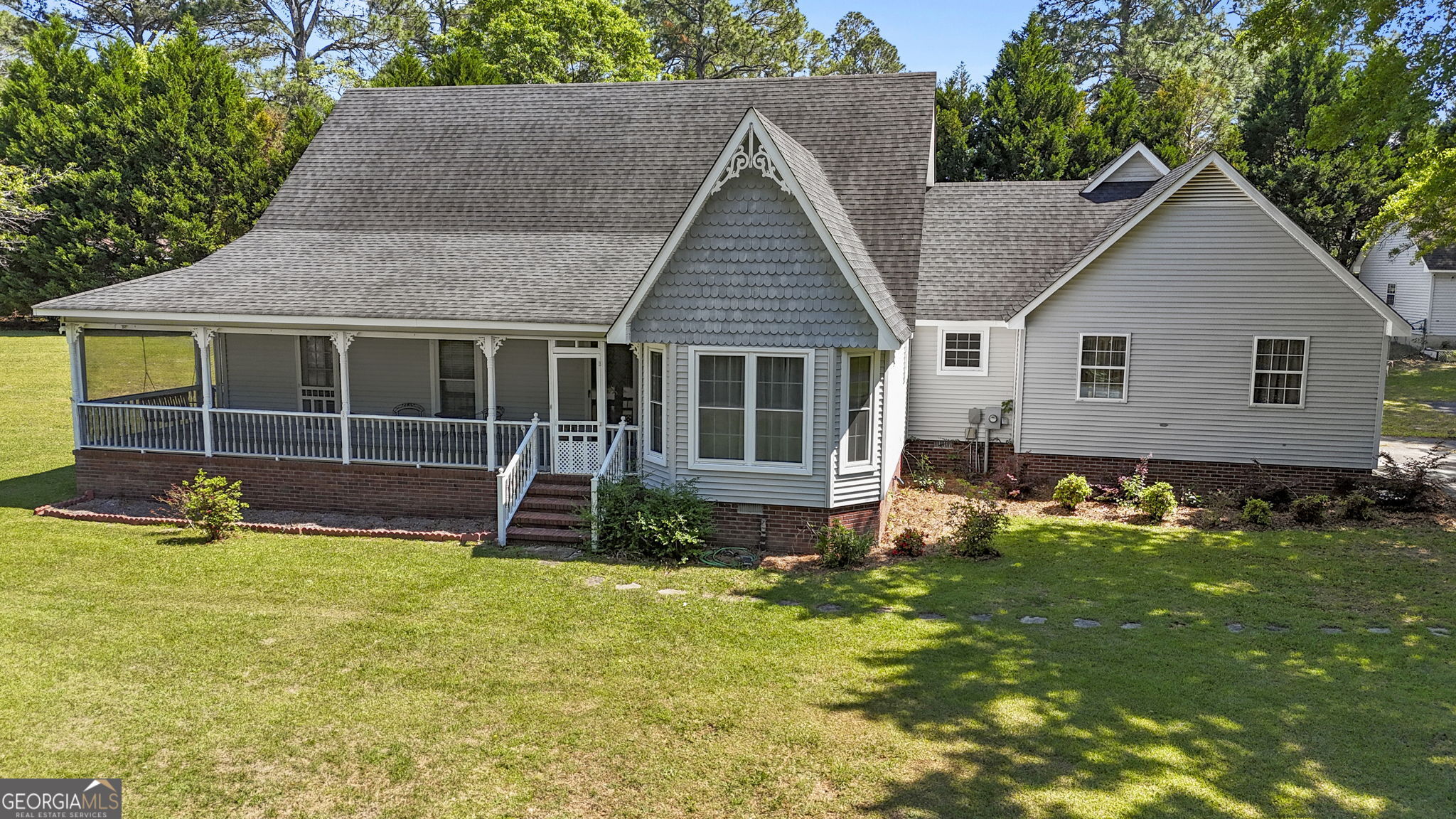 119 Moll Drive Cochran, GA 31014 - Photo 3 of 66 a front view of house with yard and green space