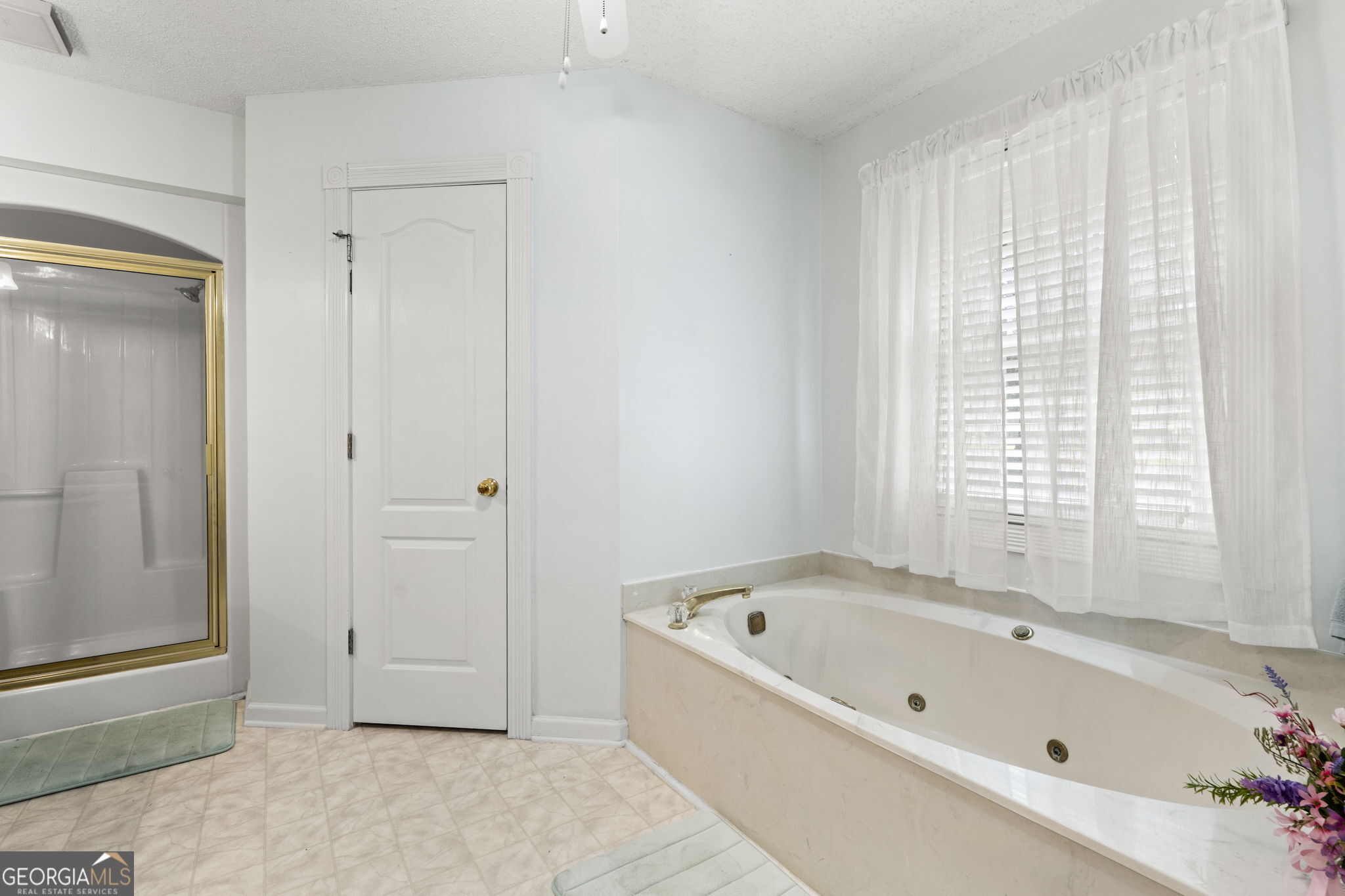 119 Moll Drive Cochran, GA 31014 - Photo 36 of 66 a bathroom with a bathtub and shower