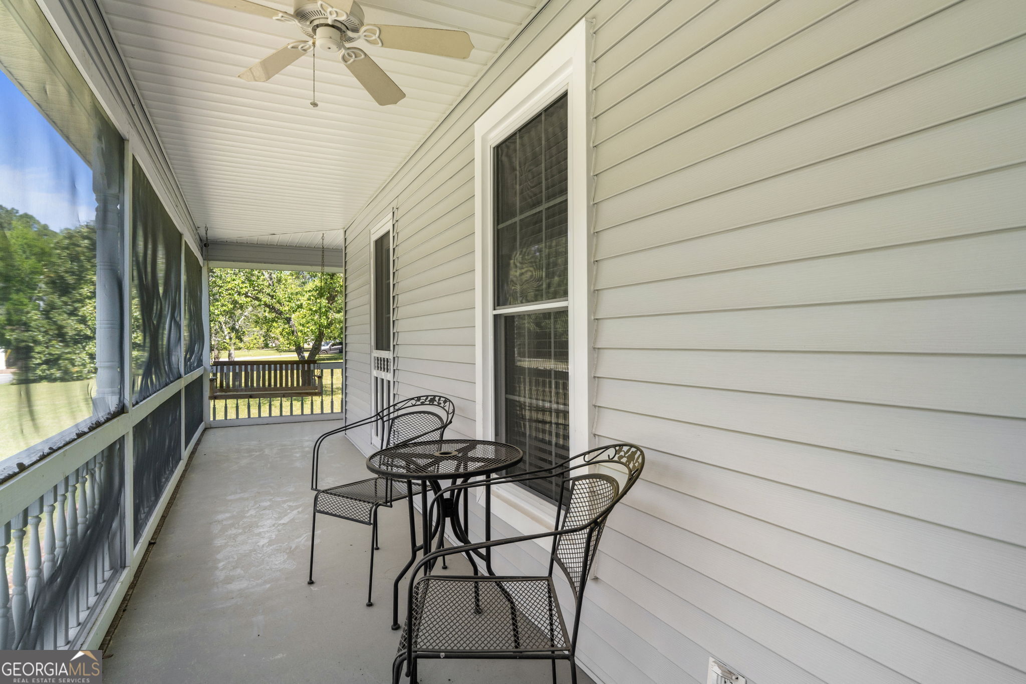 119 Moll Drive Cochran, GA 31014 - Photo 38 of 66 a view of a balcony with furniture