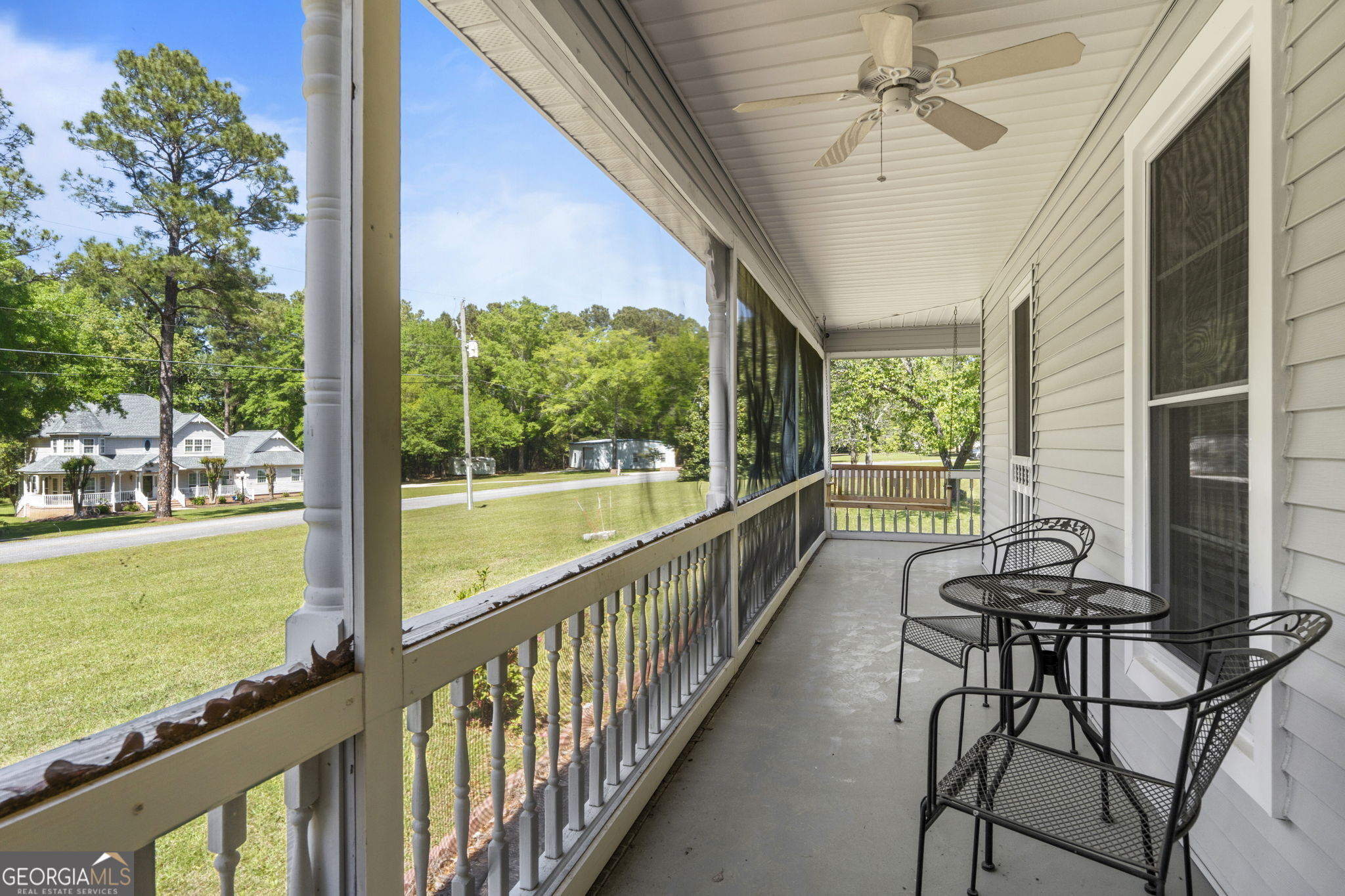 119 Moll Drive Cochran, GA 31014 - Photo 39 of 66 a view of a porch with furniture and garden