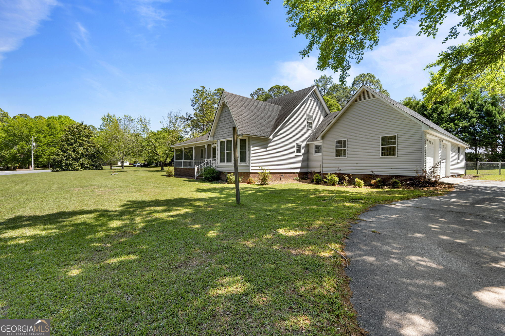 119 Moll Drive Cochran, GA 31014 - Photo 45 of 66 a view of a house with a big yard