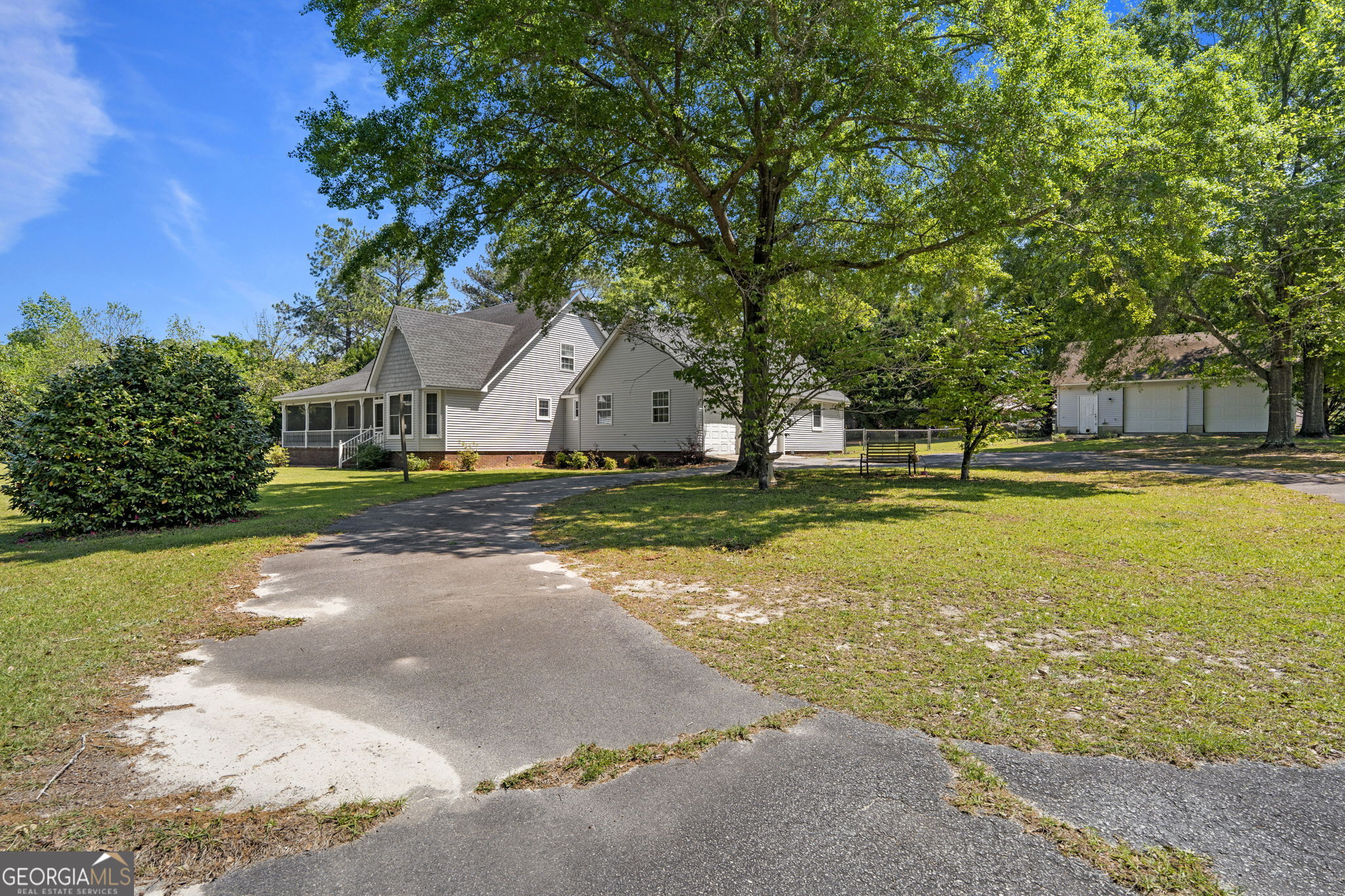 119 Moll Drive Cochran, GA 31014 - Photo 46 of 66 a view of a house with swimming pool and sitting area