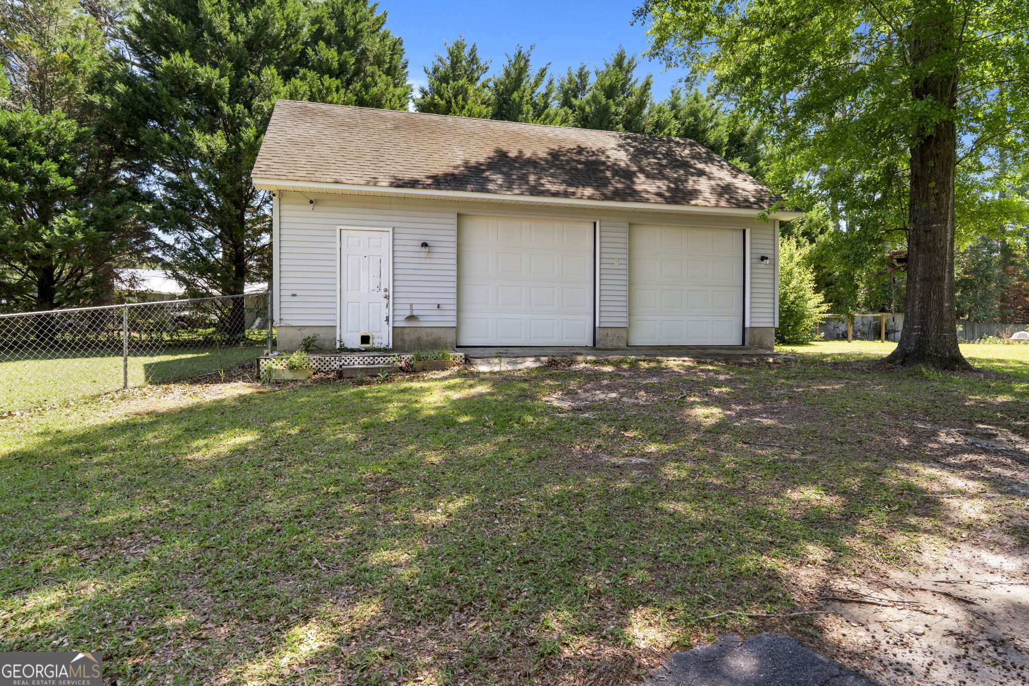 119 Moll Drive Cochran, GA 31014 - Photo 51 of 66 a view of a house with a yard