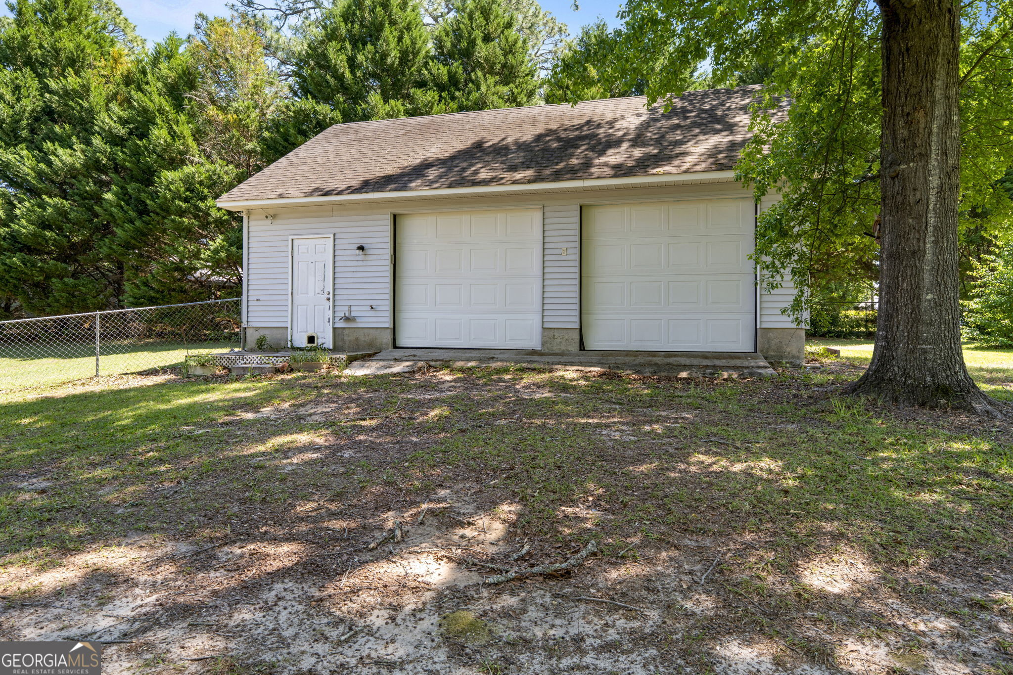 119 Moll Drive Cochran, GA 31014 - Photo 52 of 66 a backyard of a house
