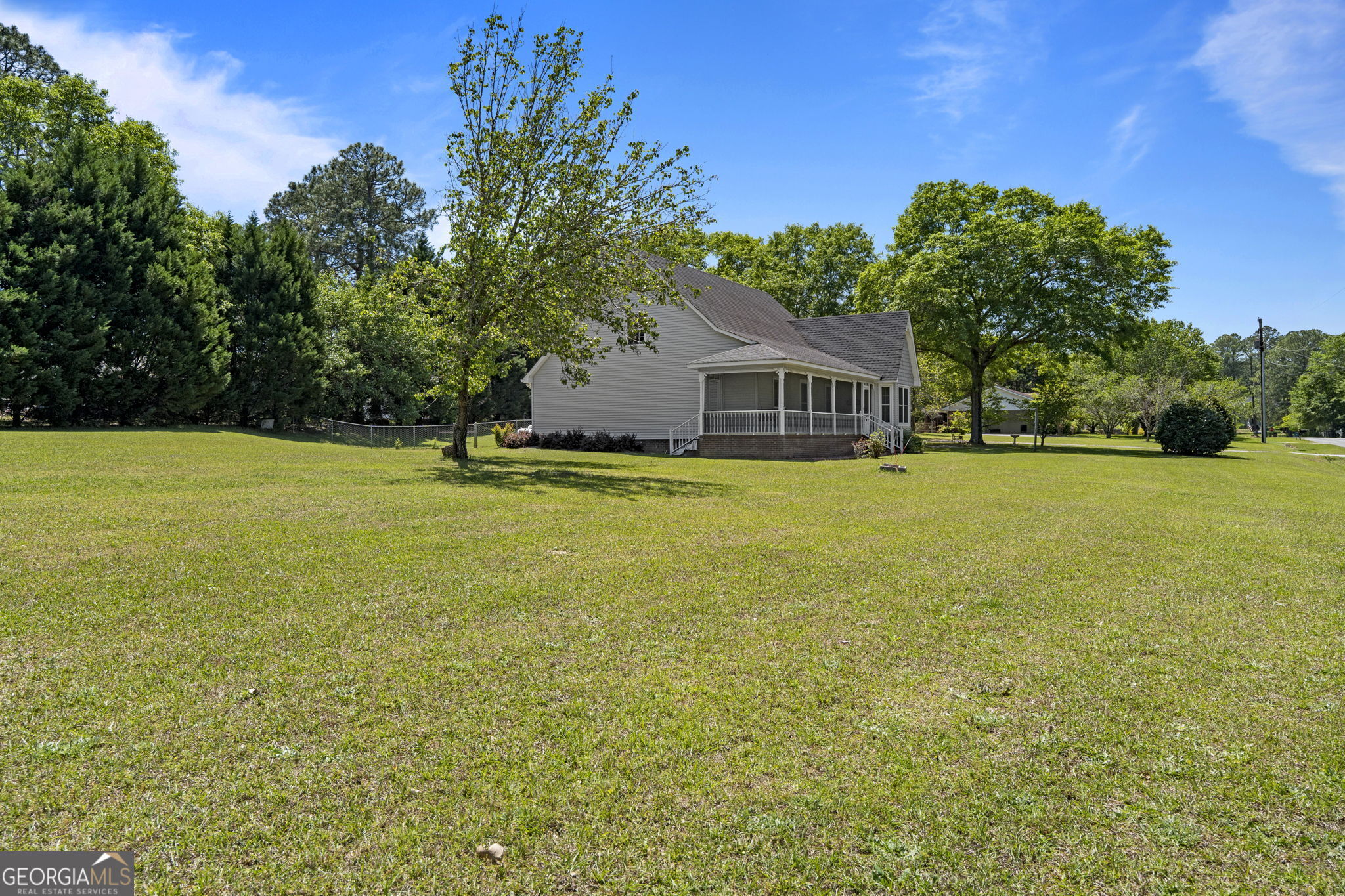 119 Moll Drive Cochran, GA 31014 - Photo 55 of 66 a house with a garden