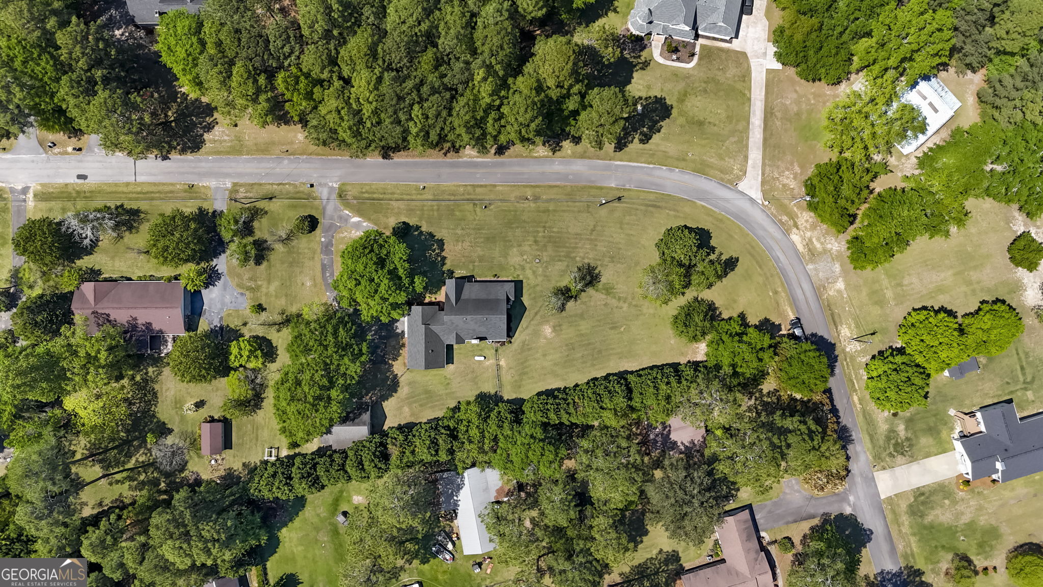 119 Moll Drive Cochran, GA 31014 - Photo 59 of 66 an aerial view of a house with a yard