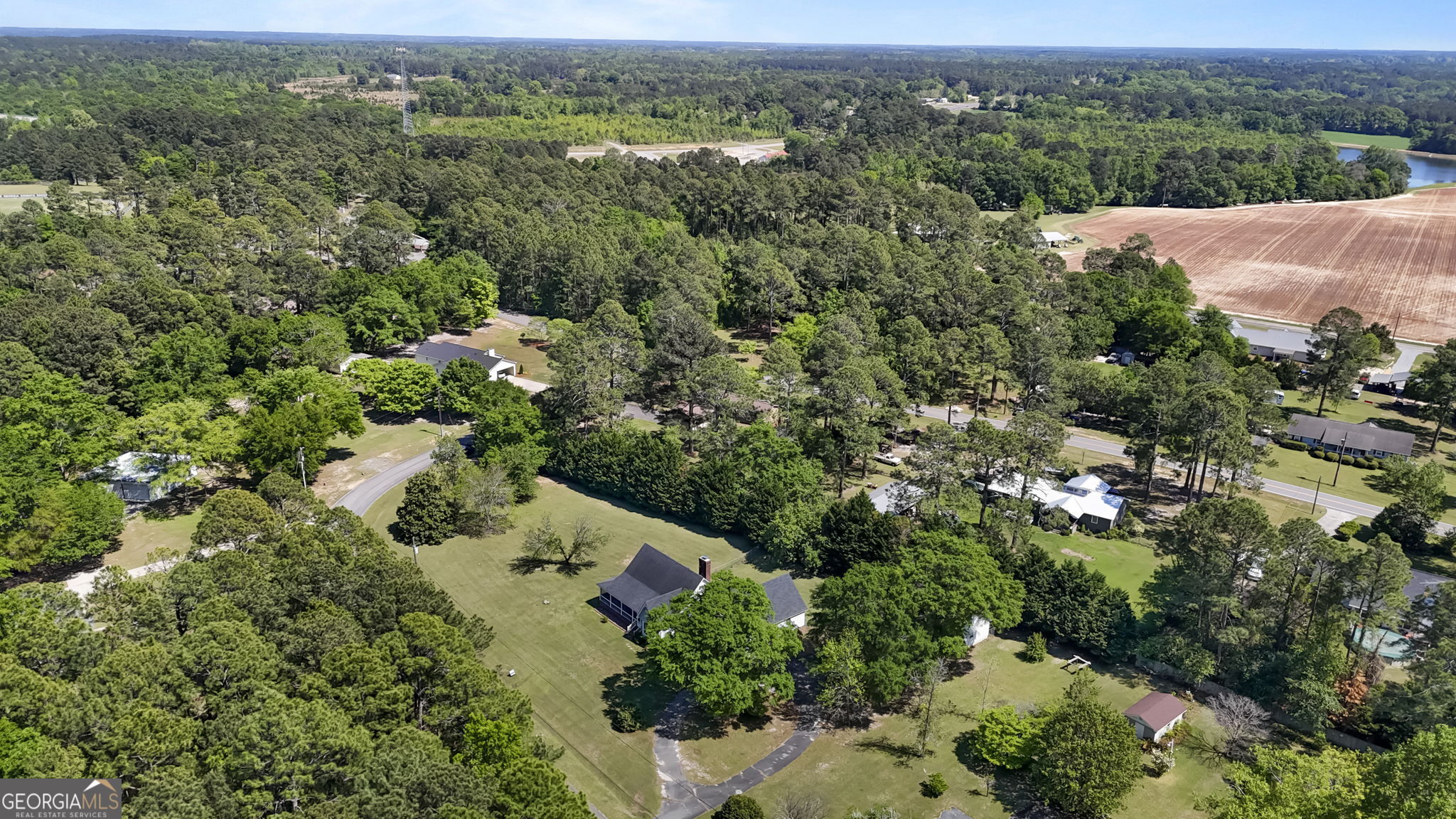 119 Moll Drive Cochran, GA 31014 - Photo 60 of 66 an aerial view of a house with a yard