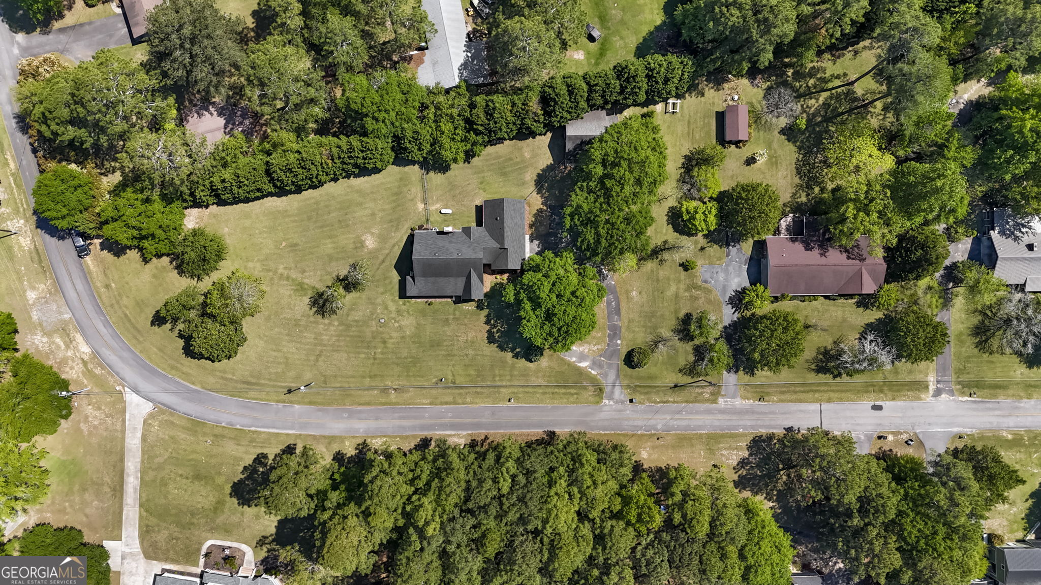 119 Moll Drive Cochran, GA 31014 - Photo 62 of 66 an aerial view of a house with a yard