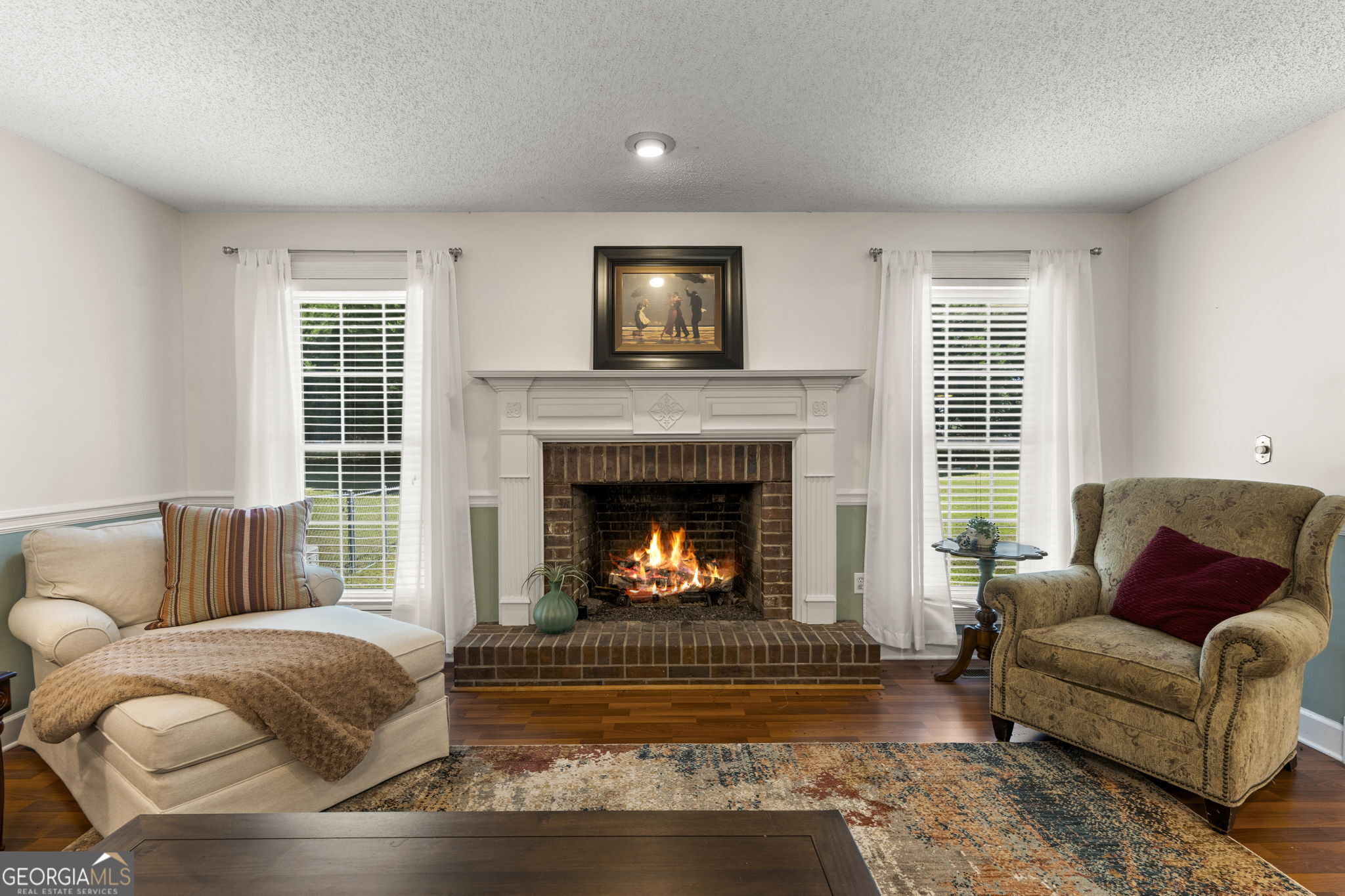 119 Moll Drive Cochran, GA 31014 - Photo 9 of 66 a living room with furniture and a fireplace