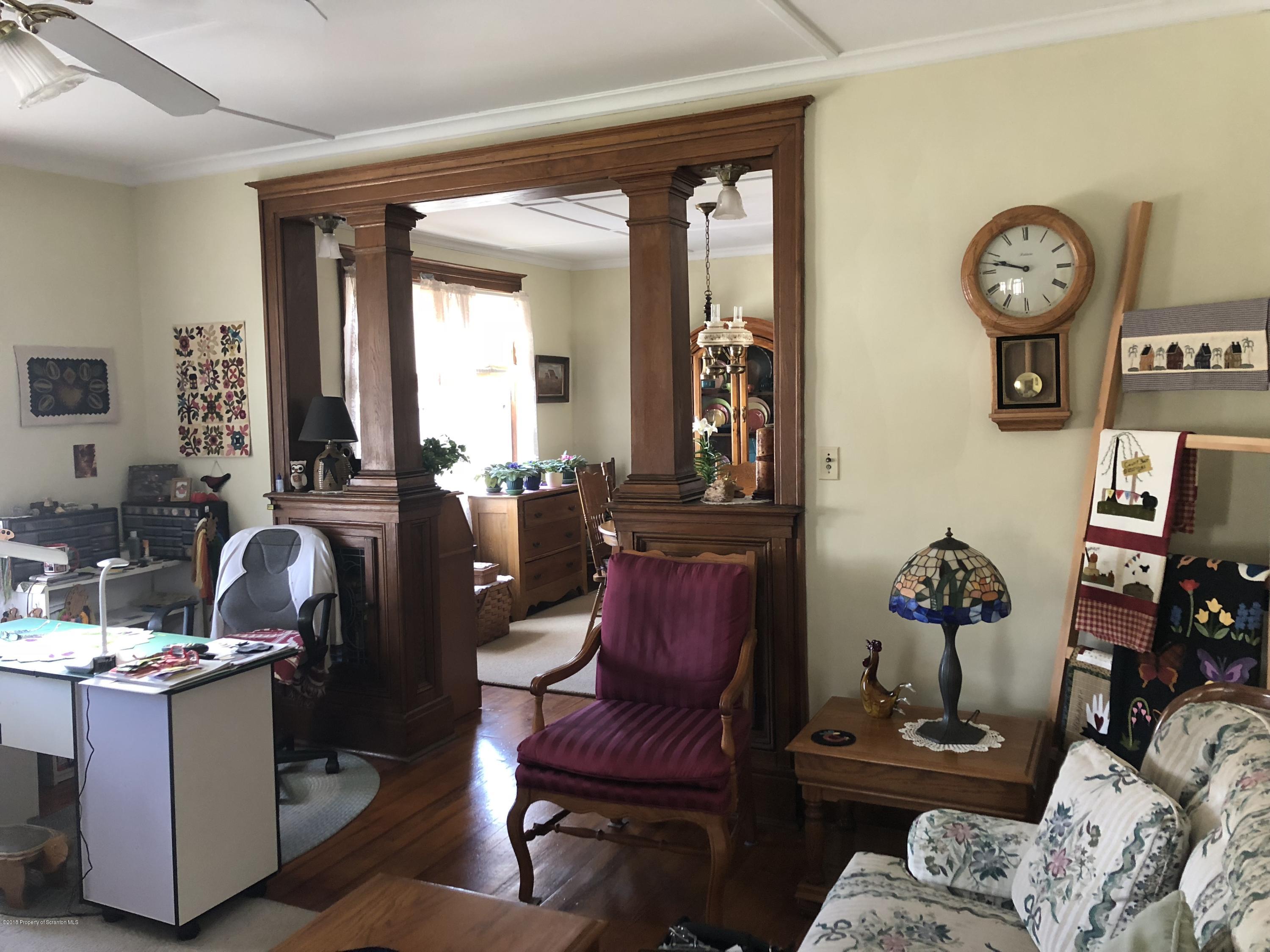 1640-1642 Farr Street Scranton, PA 18504 - Photo 3 of 12 a living room with furniture and a mirror