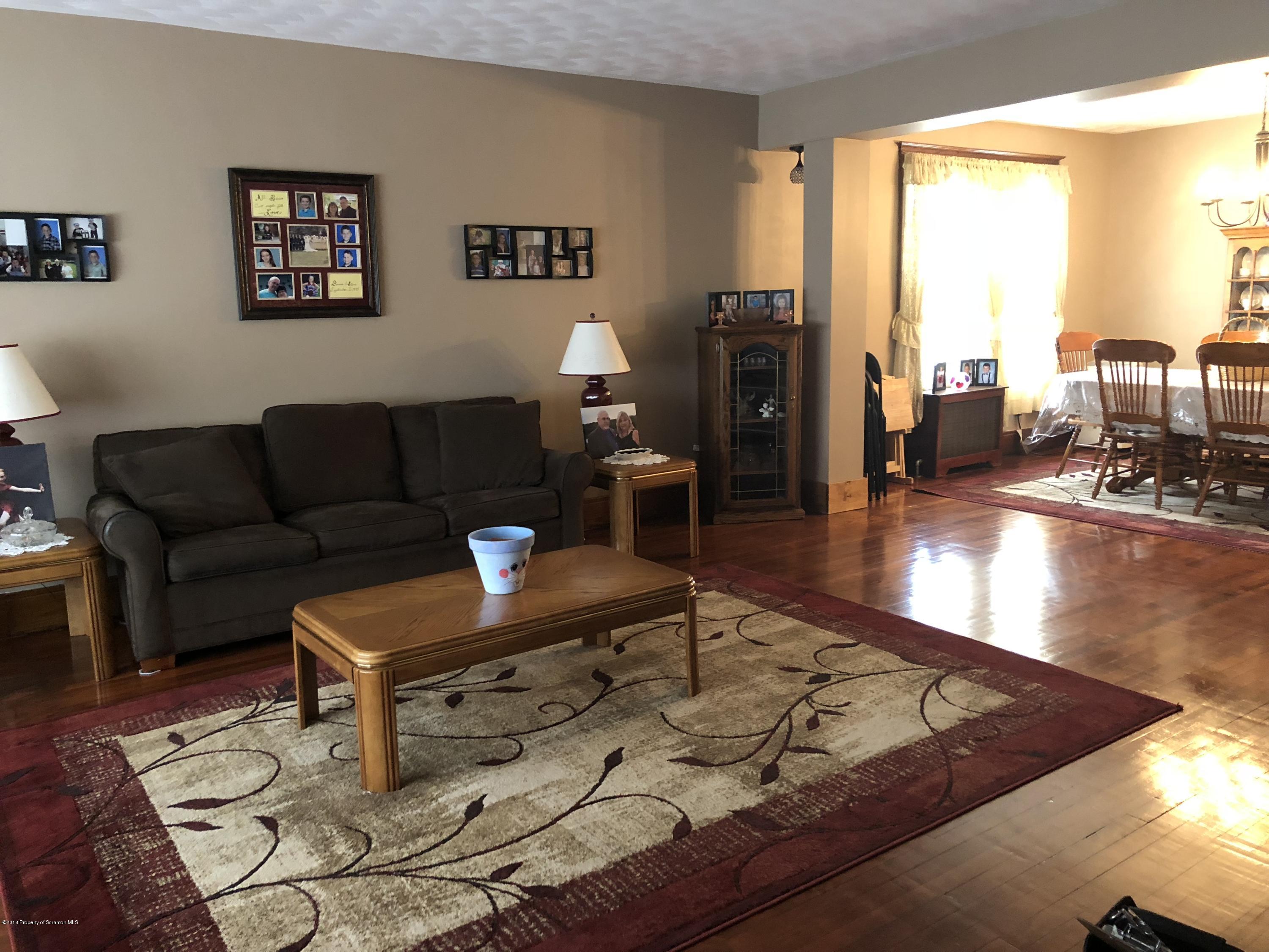 1640-1642 Farr Street Scranton, PA 18504 - Photo 5 of 12 a living room with furniture and a large window