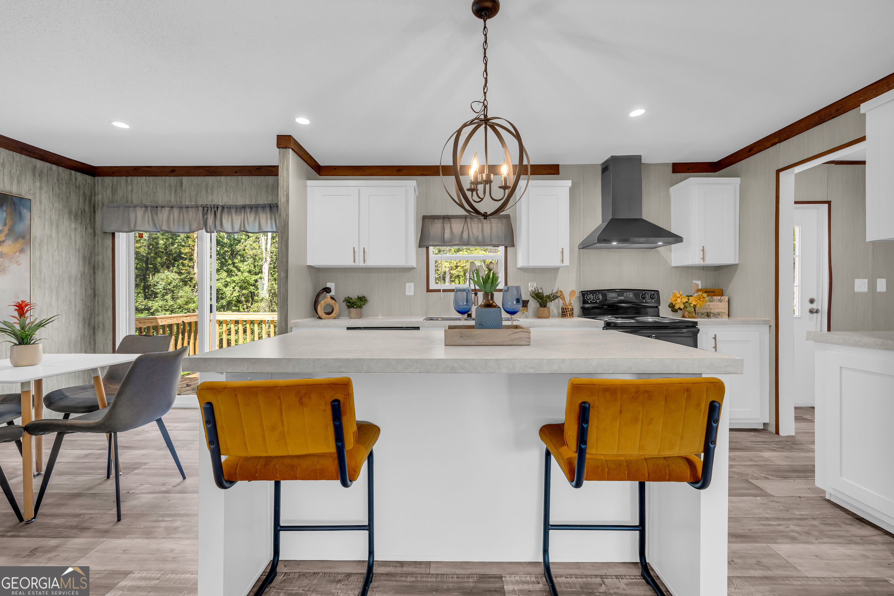31 Dons Court Royston, GA 30662 - Photo 18 of 51 a open kitchen with stainless steel appliances granite countertop wooden floor dining table and chairs