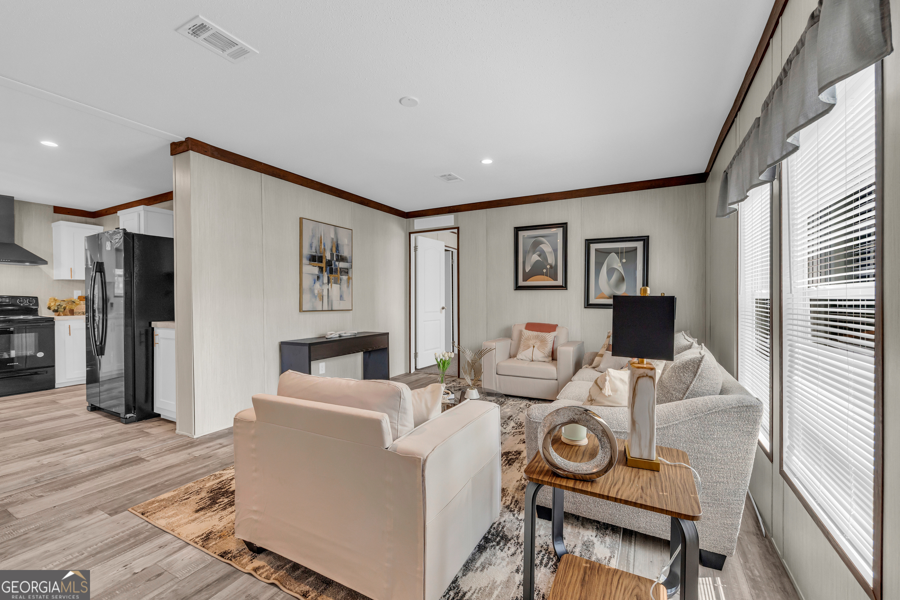 31 Dons Court Royston, GA 30662 - Photo 8 of 51 a living room with furniture and a flat screen tv
