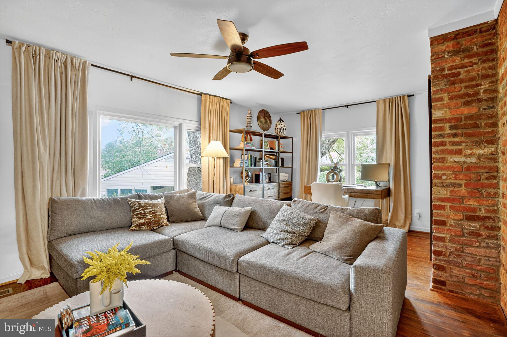 4004 David Lane Alexandria, VA 22311 - Photo 12 of 25 a living room with furniture and a large window