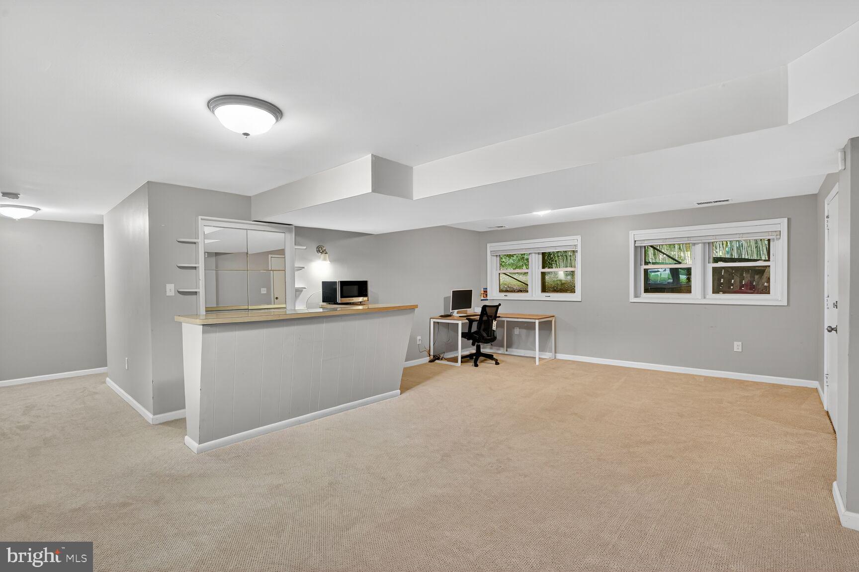 4004 David Lane Alexandria, VA 22311 - Photo 19 of 25 a view of a kitchen with furniture and a refrigerator