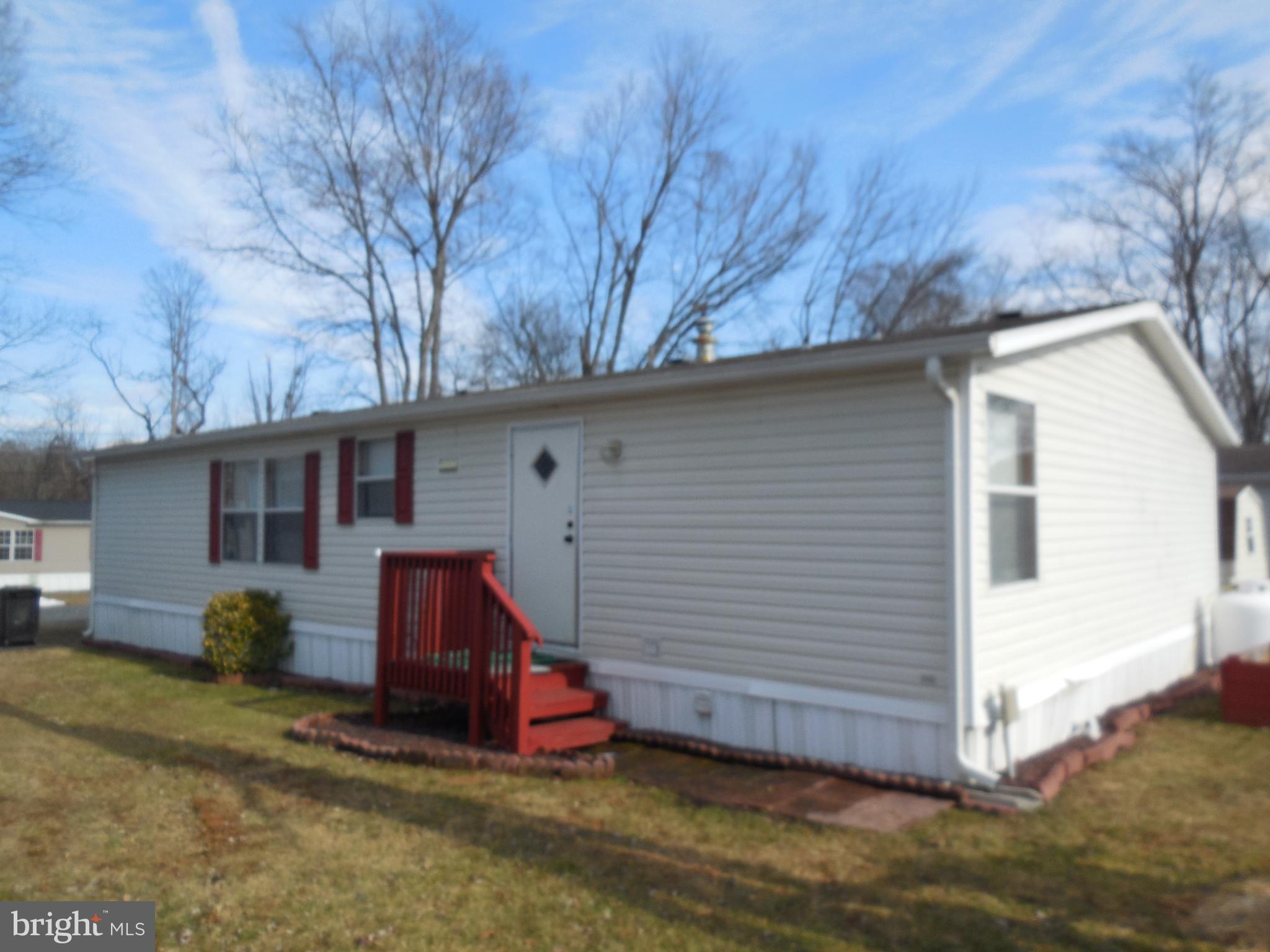 4041 Conowingo Road, Unit 14 Darlington, MD 21034 - Photo 2 of 27 a view of a house with a yard