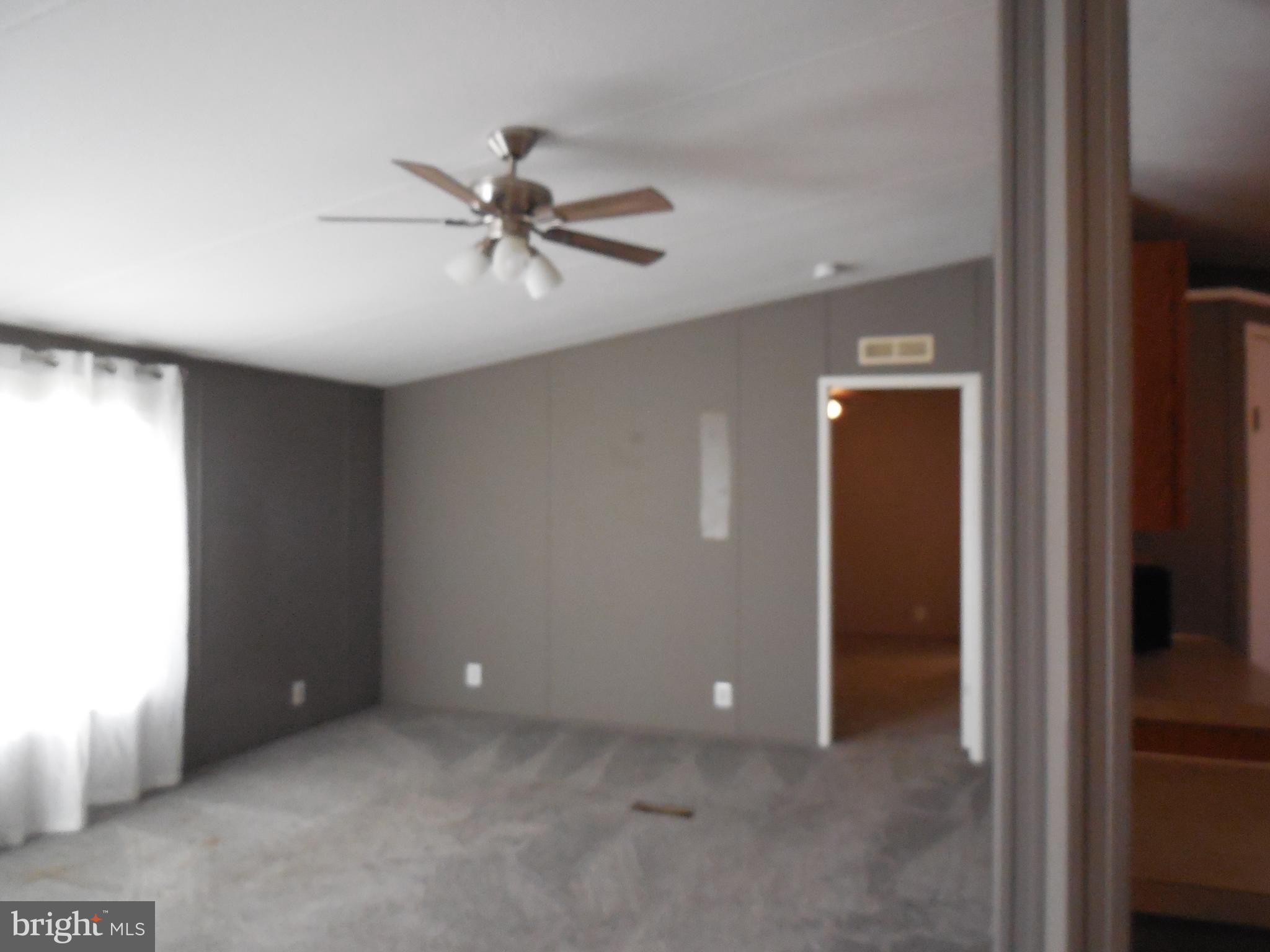 4041 Conowingo Road, Unit 14 Darlington, MD 21034 - Photo 9 of 27 a view of an empty room with a window